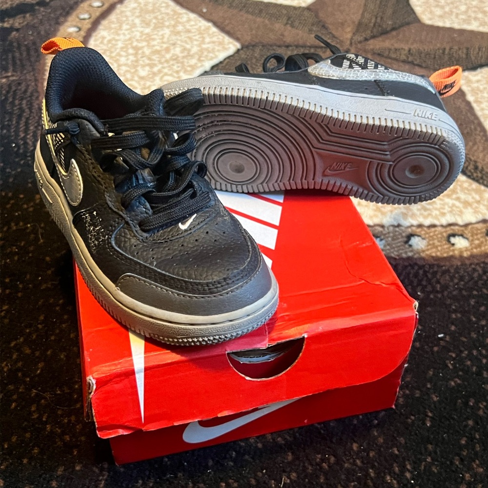 Nike Black and Gray Sneakers with Orange Accents